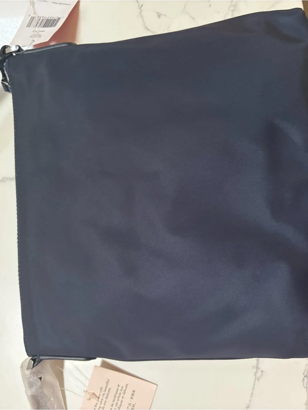 kate spade navy blue nylon crossbody with gold logo